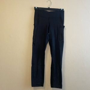 Lulu Lemon black capri leggings, size 4